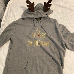 Size medium “Oh deer I’m pregnant” Christmas sweater. New without tags.